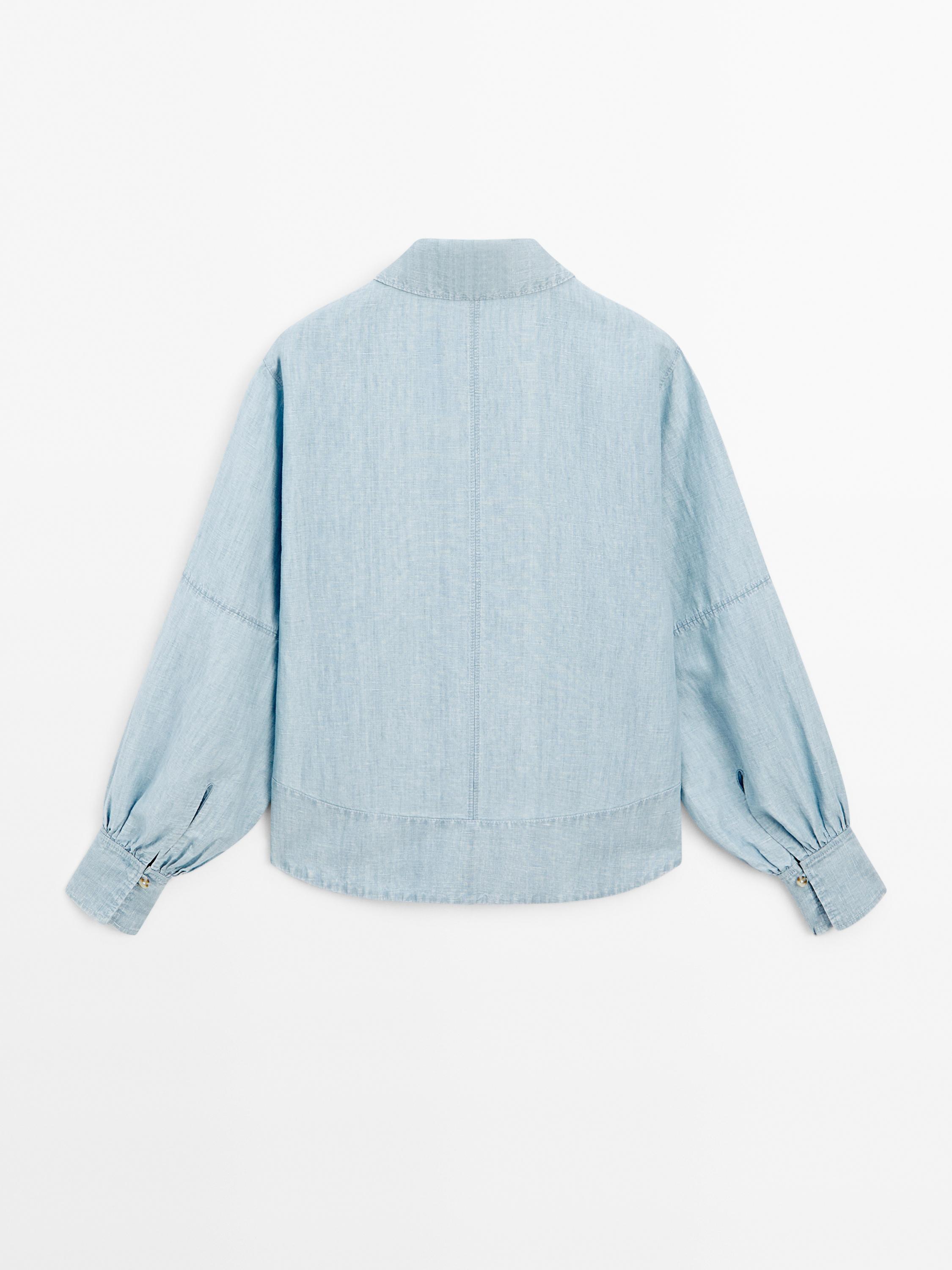 Oversize denim blouse with puff sleeves
